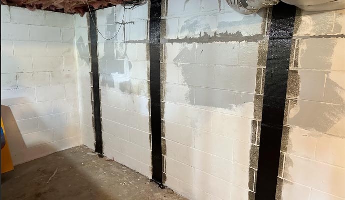 Professional structural wall repair in progress Professional structural wall repair in progress.