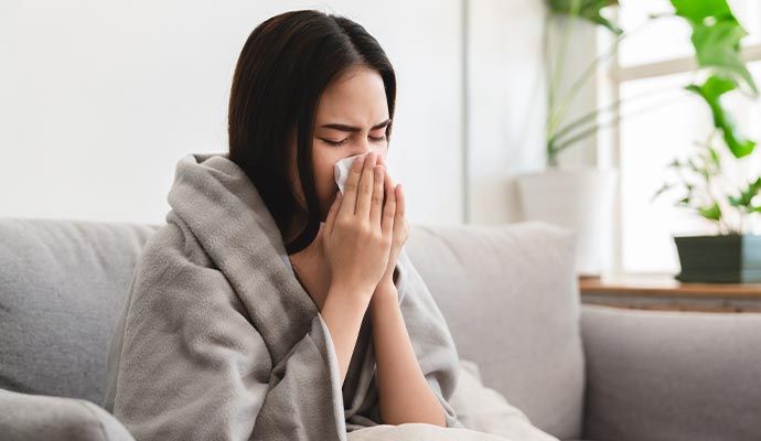 Girl suffering for sneezing Girl suffering for sneezing