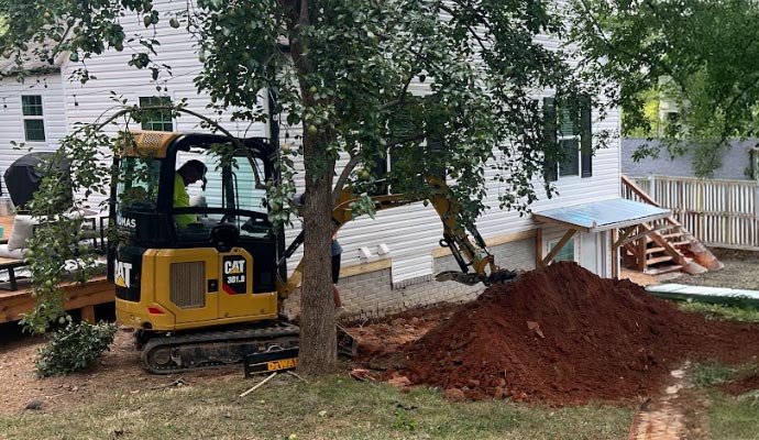 Skid steer working on a construction site Skid steer working on a construction site
